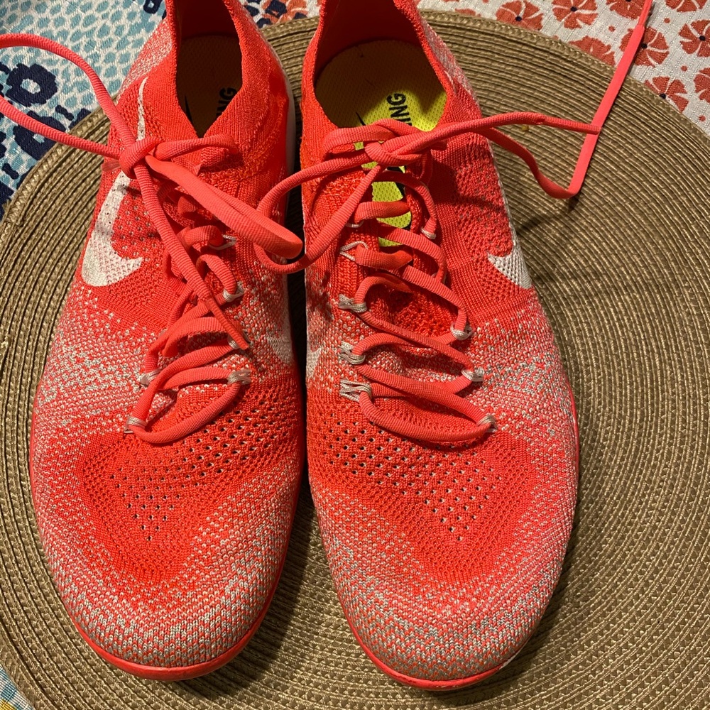Women’s pink Nike running shoes size 9